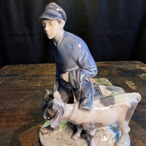Royal Copenhagen vintage figurine #1858 "Boy with Calves"  - * small chip*